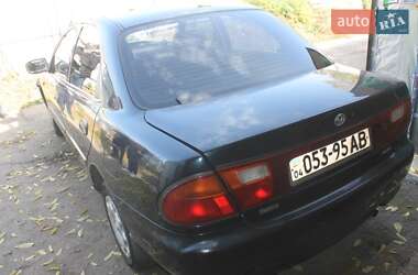 Седан Mazda 323 1996 в 