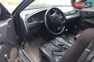 Седан Mazda 323 1996 в 