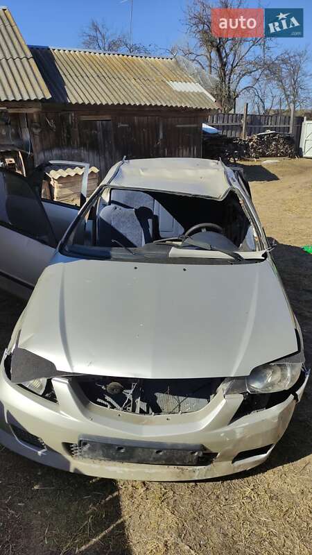 Седан Mazda 323 1999 в Сосницях