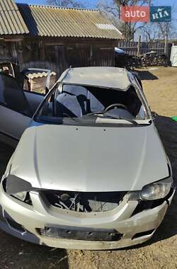 Седан Mazda 323 1999 в 