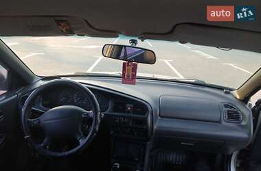 Седан Mazda 323 1996 в 