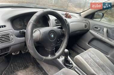 Седан Mazda 323 1999 в Білій Церкві