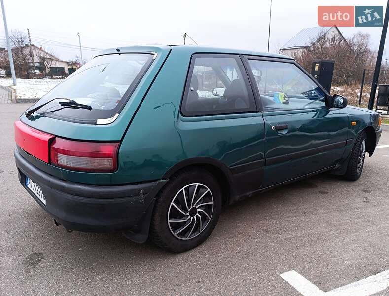 Mazda 323 1992 JMZBG13C200658479 - history of car sales on