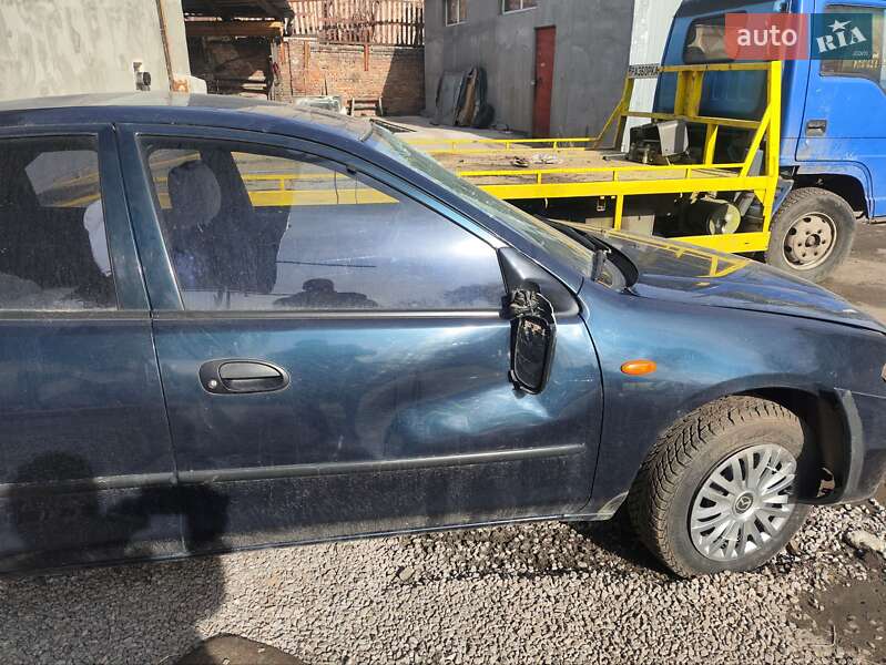 Седан Mazda 323 1996 в Запоріжжі