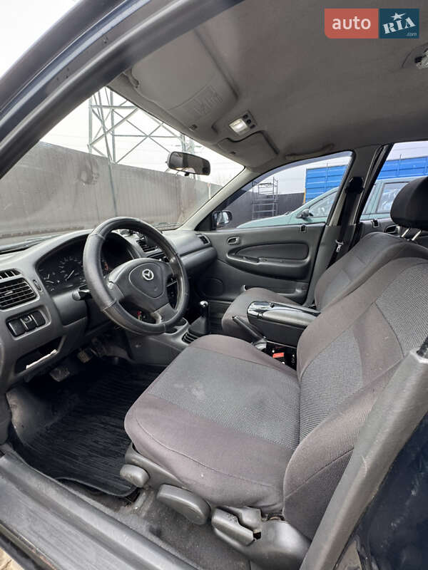 Седан Mazda 323 1997 в Одессе фото 8 Седан Mazda 323 1997 в Одессе