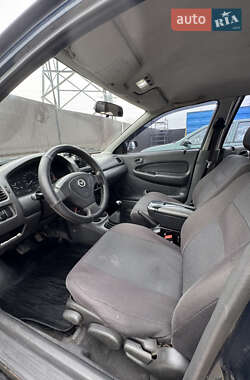 Седан Mazda 323 1997 в 