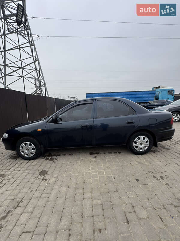 Седан Mazda 323 1997 в Одессе фото 14 Седан Mazda 323 1997 в Одессе