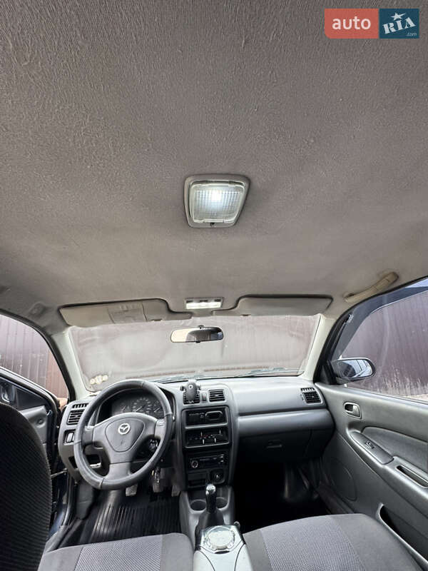 Седан Mazda 323 1997 в Одессе фото 25 Седан Mazda 323 1997 в Одессе