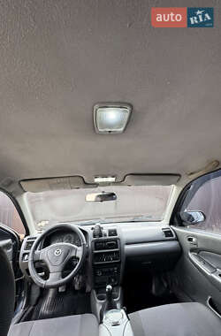 Седан Mazda 323 1997 в 