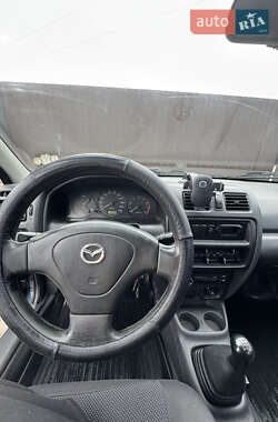 Седан Mazda 323 1997 в 
