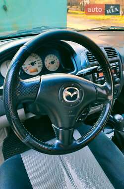 Седан Mazda 323 2003 в 