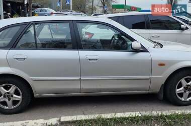 Хэтчбек Mazda 323 2003 в 