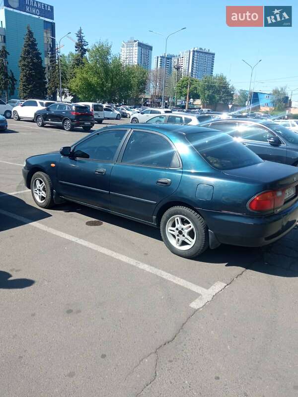 Седан Mazda 323 1994 в Одесі фото 2 Седан Mazda 323 1994 в Одесі