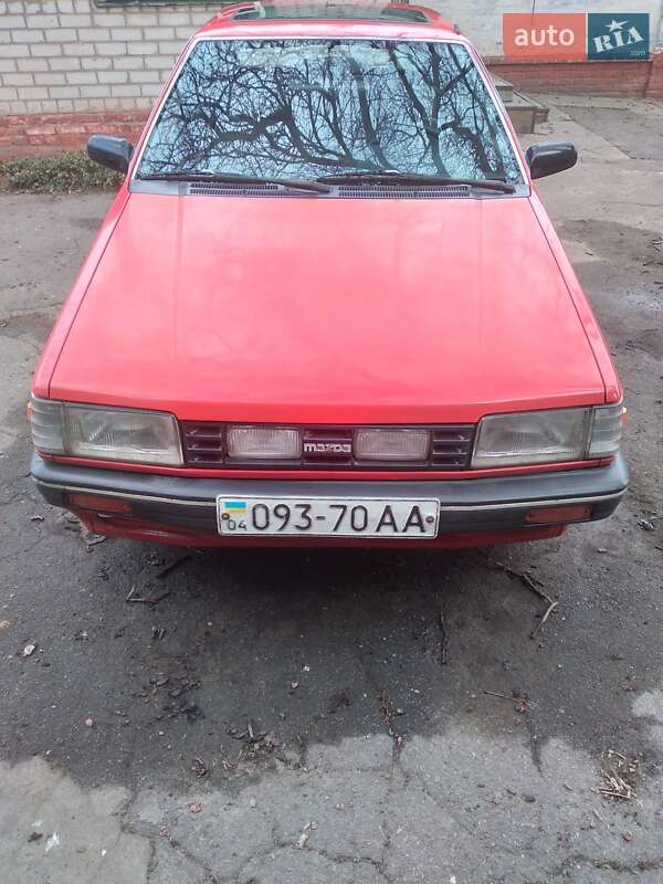 Хетчбек Mazda 323 1987 в 
