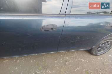 Седан Mazda 323 1997 в 
