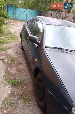 Хетчбек Mazda 323 1994 в 