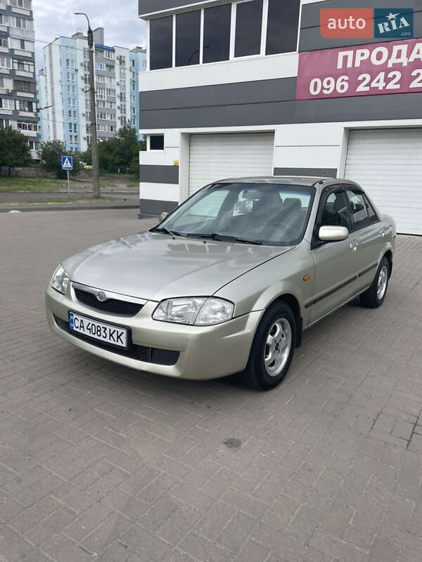 Седан Mazda 323 1998 в 