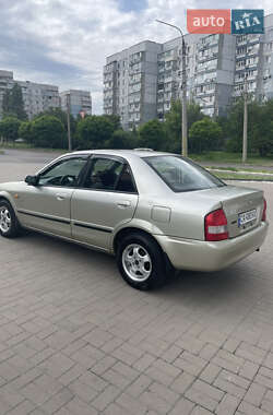 Седан Mazda 323 1998 в 