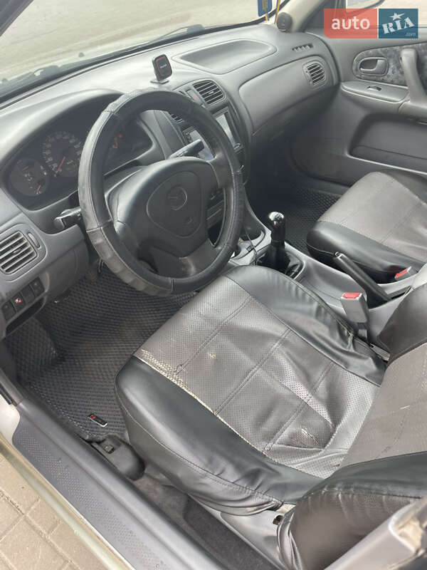 Седан Mazda 323 1998 в Черкасах