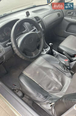 Седан Mazda 323 1998 в 