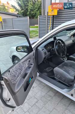 Хэтчбек Mazda 323 1999 в 