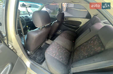 Седан Mazda 323 1998 в 