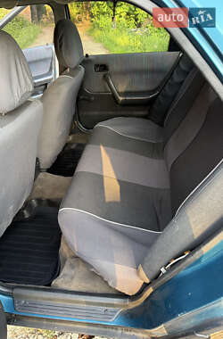 Хетчбек Mazda 323 1995 в 