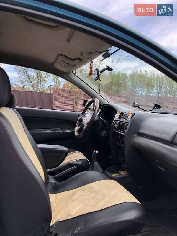 Хэтчбек Mazda 323 1997 в Киеве фото 6 Хэтчбек Mazda 323 1997 в Киеве