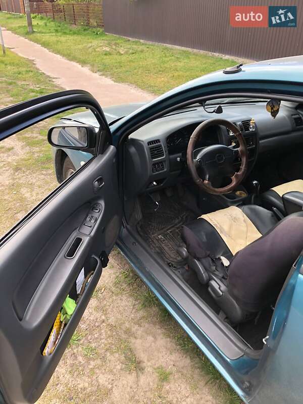 Хэтчбек Mazda 323 1997 в Киеве фото 13 Хэтчбек Mazda 323 1997 в Киеве