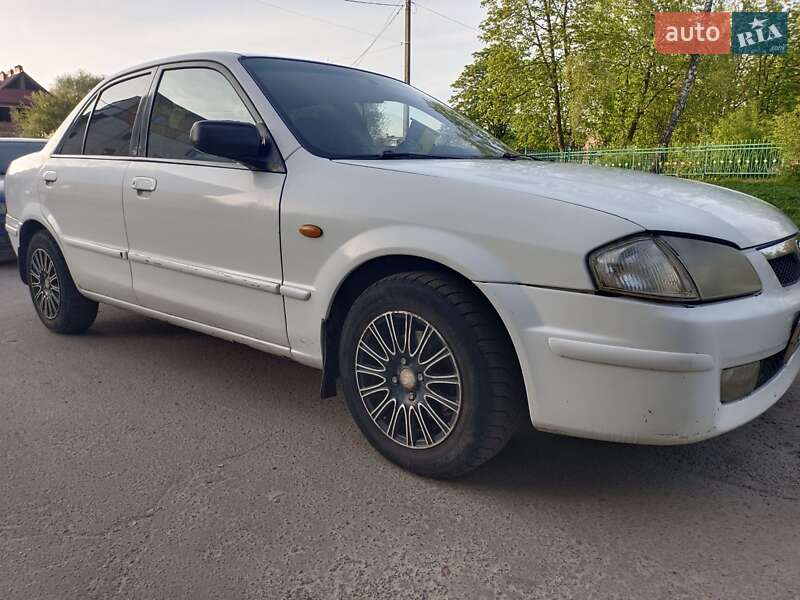 Седан Mazda 323 1999 в Белзі