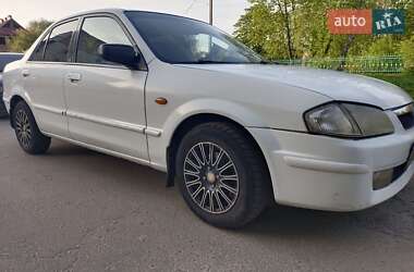Седан Mazda 323 1999 в 