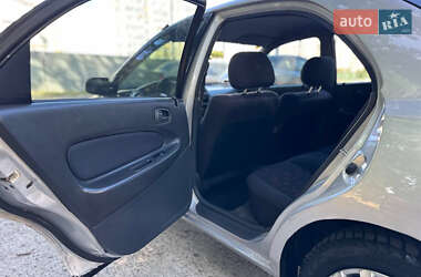 Седан Mazda 323 1998 в 