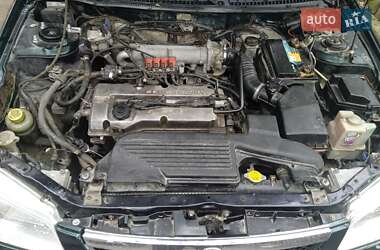 Седан Mazda 323 1998 в 