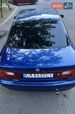 Седан Mazda 323 1997 в 