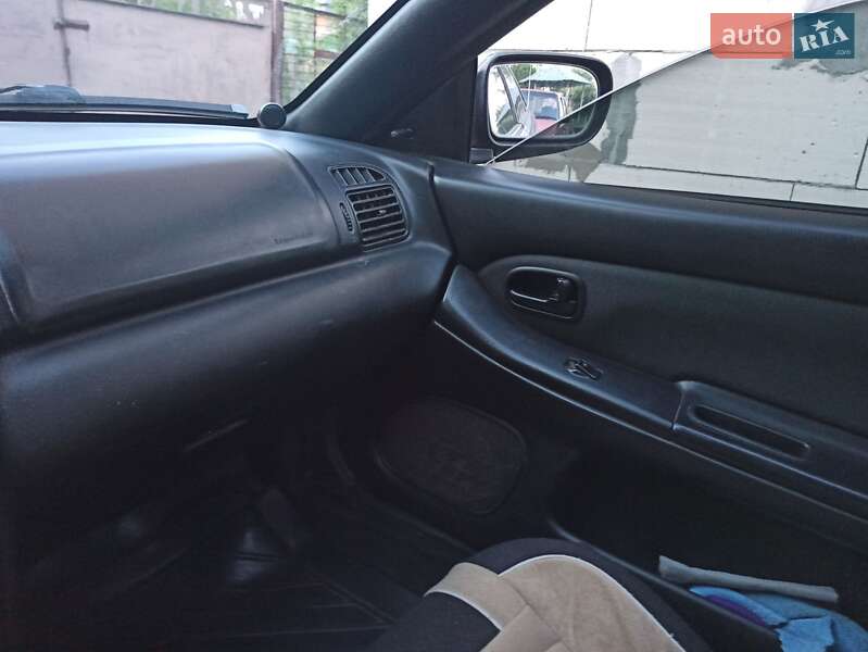 Седан Mazda 323 1998 в Белой Церкви фото 27 Седан Mazda 323 1998 в Белой Церкви