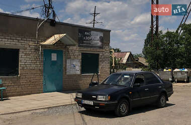 Седан Mazda 323 1986 в 