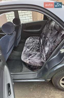Седан Mazda 323 1998 в 