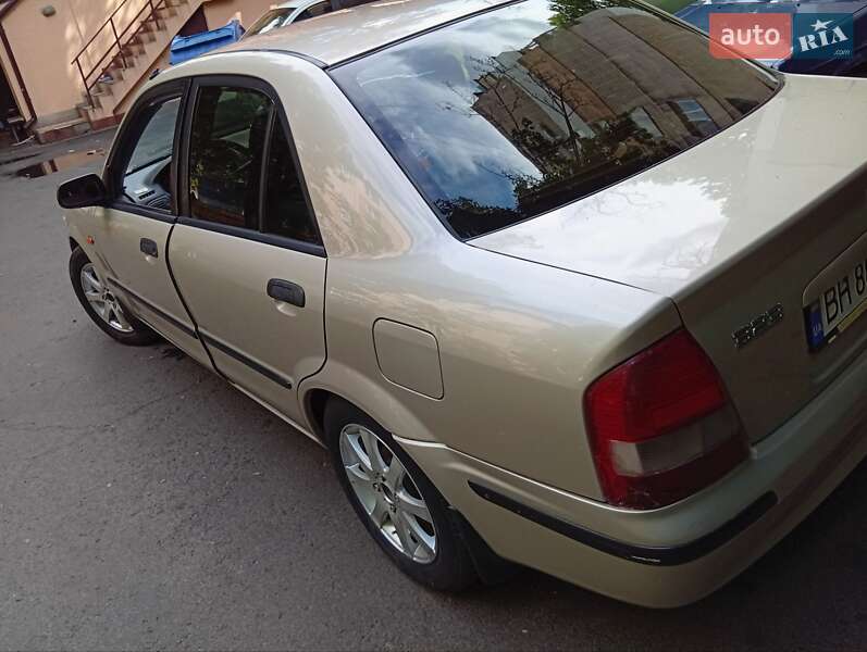 Седан Mazda 323 1999 в Одессе фото 7 Седан Mazda 323 1999 в Одессе
