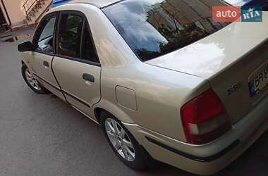 Седан Mazda 323 1999 в 