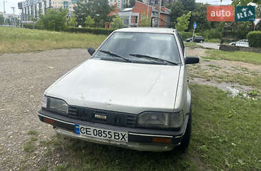 Седан Mazda 323 1989 в 