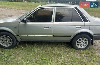 Седан Mazda 323 1989 в 