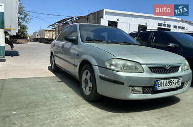 Седан Mazda 323 1998 в 