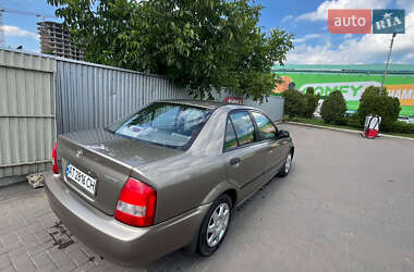 Седан Mazda 323 1999 в 