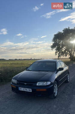 Седан Mazda 323 1996 в Голобах
