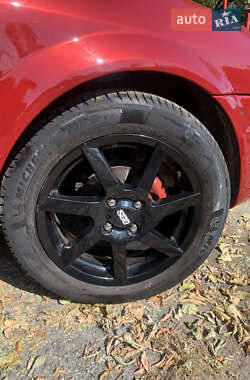 Хетчбек Mazda 323 1999 в 