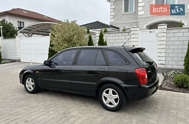Хэтчбек Mazda 323 2003 в 
