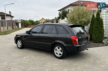 Хэтчбек Mazda 323 2003 в 