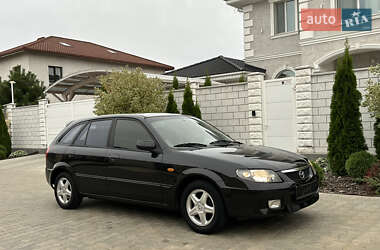 Хэтчбек Mazda 323 2003 в 