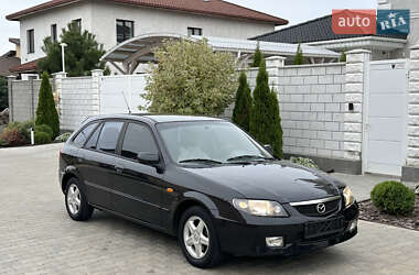 Хэтчбек Mazda 323 2003 в 