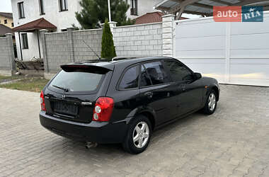 Хэтчбек Mazda 323 2003 в 